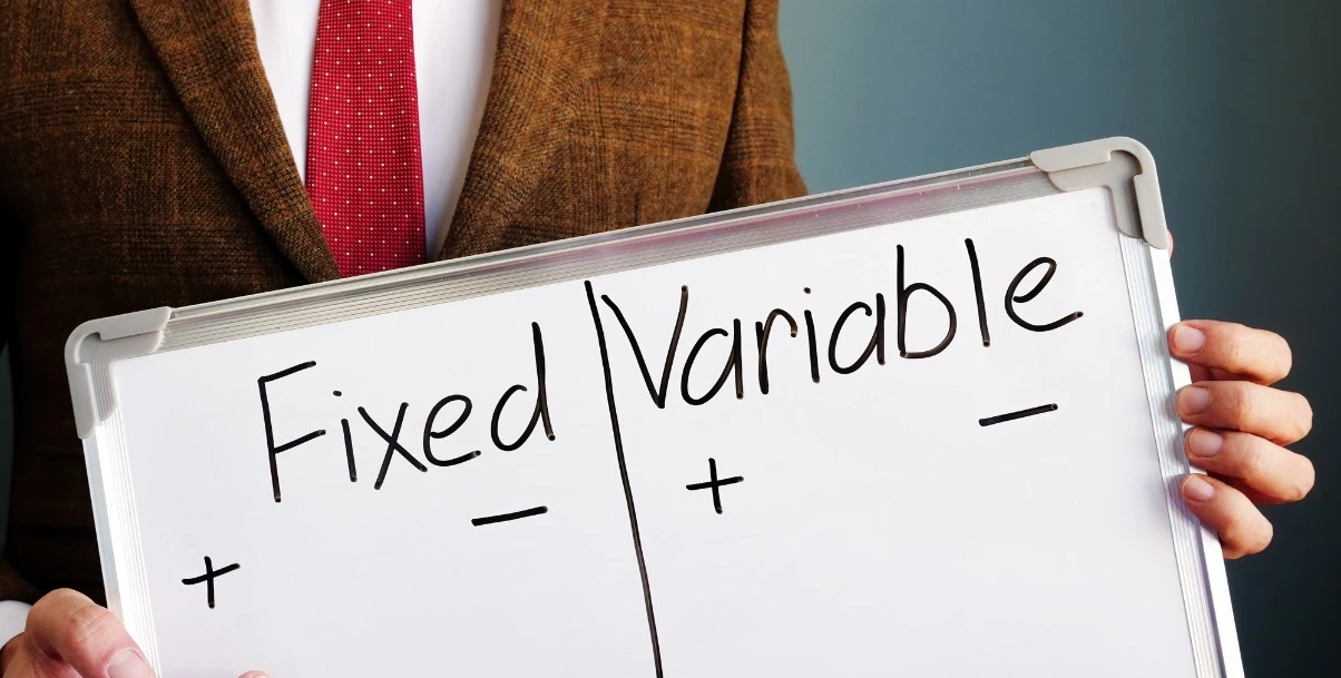 Fixed vs variable costs concept explaining startup burn rate and managing runway in financial planning.